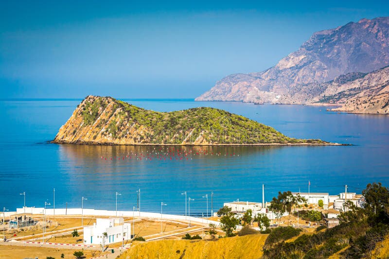 L'isolotto e il mare turchese di Cala Iris